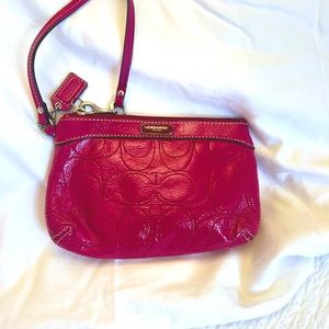 COACH WRISTLET/Burgandy Pink/ AUTHENTIC perforated glossy with NO Flaws!